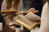 side-view-people-holding-books