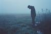 Solitary Figure in Frosty Landscape