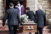 death-funeral-and-holding-coffin-in-church-for-gr-2023-11-27-05-09-23-utc-768x512