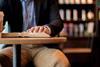 man-in-cafe-with-bible