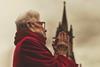 Contemplative Elderly Woman in Prayer