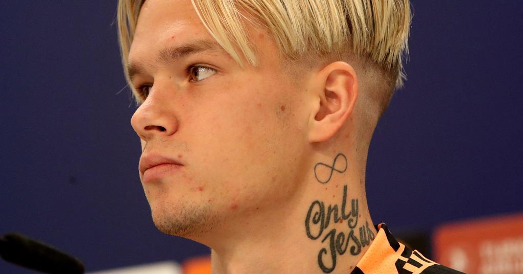 Mykhaylo Mudryk of Chelsea showing his tattooed neck during the News  Photo  Getty Images