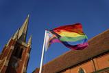 Pride flag outside a church