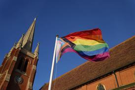 Pride flag outside a church