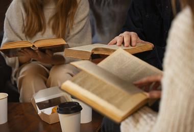 side-view-people-holding-books