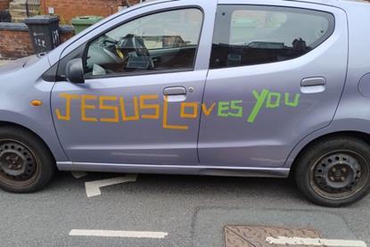 standard-picture-car-jesus-loves-you-720px-390px