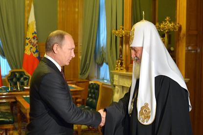 Vladimir_Putin_and_Patriarch_Kirill_I_of_Russia_(2015-11-21)_2