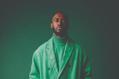 Eugy_In_Green_Trench_Coat