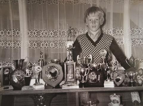 Aged 12 with some of my trophies