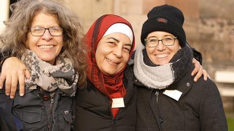 refugee-happy-group-emotions-0f821c-1024