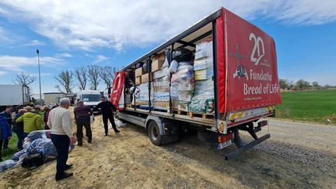 Donations arriving and helping with the van