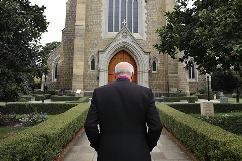 Cleric Approaching Church (1)