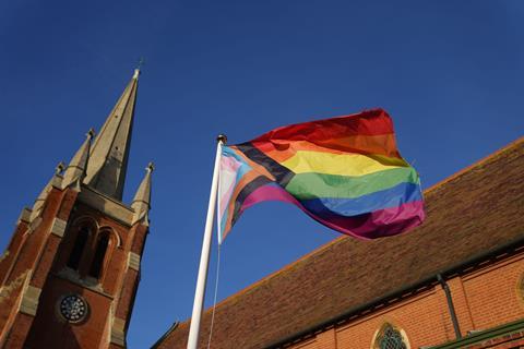 Pride flag outside a church