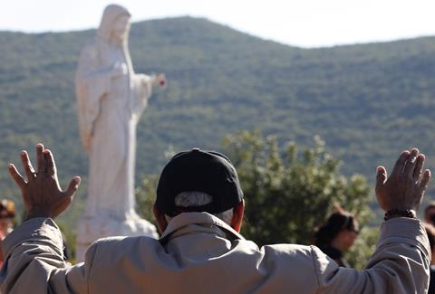 2010-10-08T120000Z_6823520_GM1E6A90CCZ01_RTRMADP_3_MEDUGORJE-VIRGIN