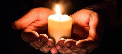 hands-candle-prayer-main