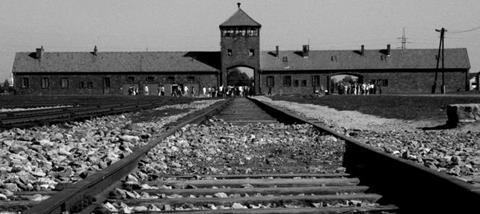 Rail_Lines_Leading_to_Death_Gate_Auschwitz_4212-bw_article_image