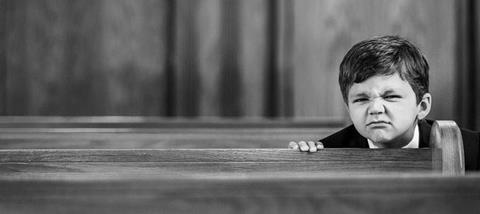 Unhappy-Child-in-Church